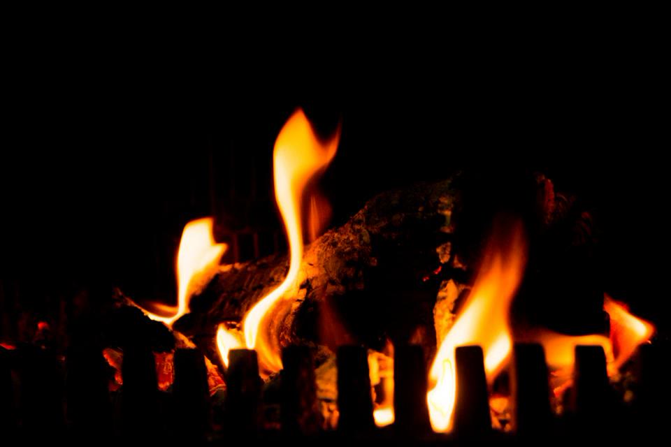 Logs burning in a fireplace